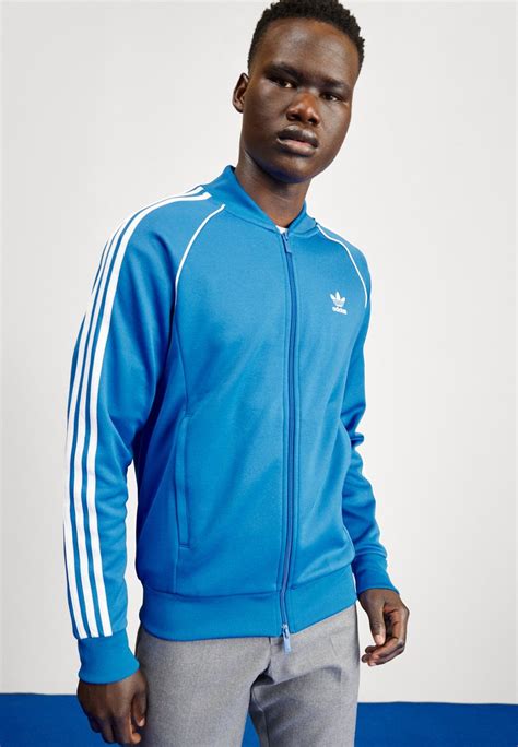 Trainingsanzüge: Adidas Originals Trainingsjacke SST TT 